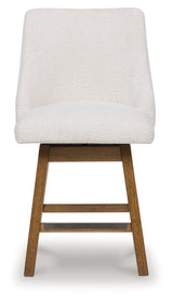 Cabalynn - Oatmeal / Light Brown - Upholstered Swivel Barstool (Set of 2)